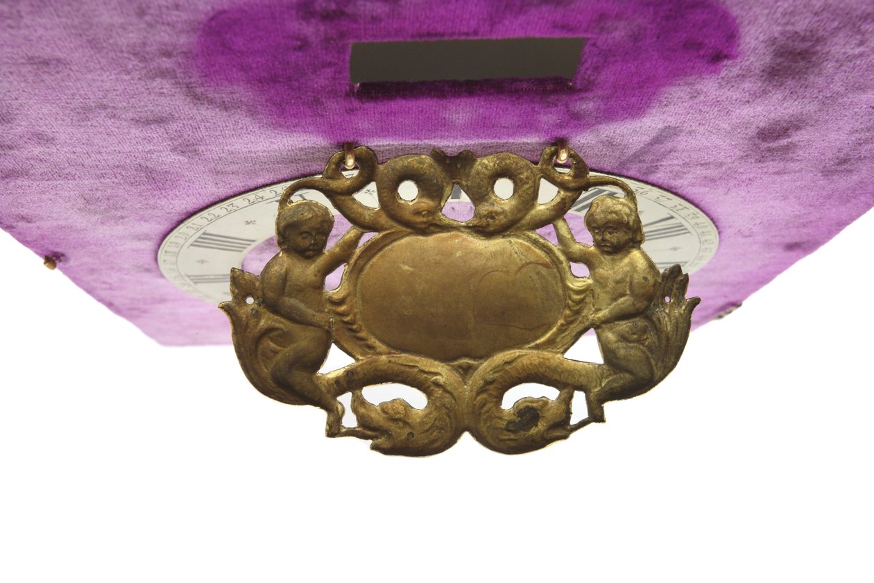 The back of the cartouche, of a table clock by Pieter Visbach