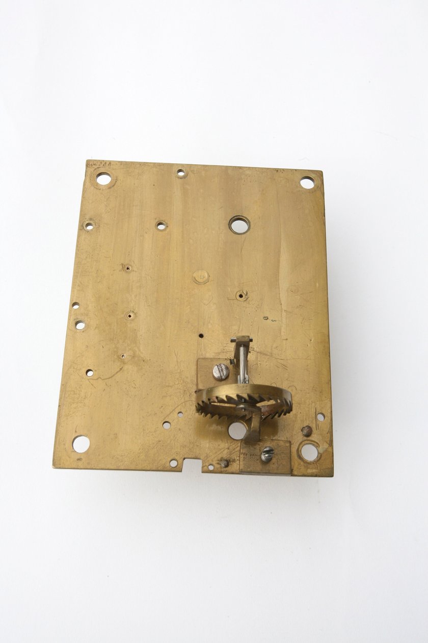The inside of the back plate of a table clock by Pieter Visbach