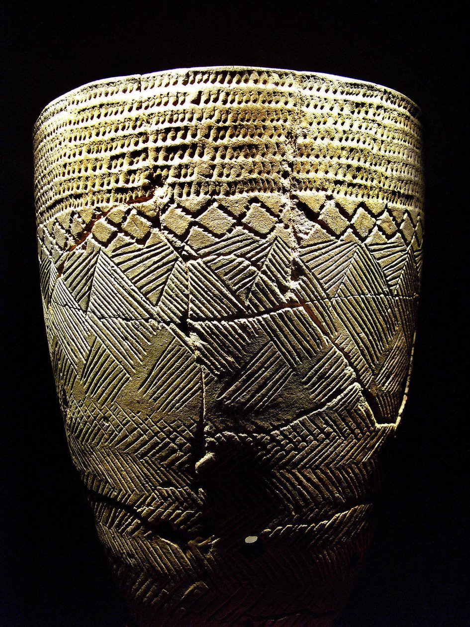 Pottery with 'comb tooth' decor, circa 8000 BC of the Neolithic Period,  Amsa-Dong, Korea. Photography, Seoul National Museum, Republic of Korea
