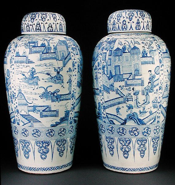 A pair of blue and white soldier vases by Qing Dynasty Chinese School