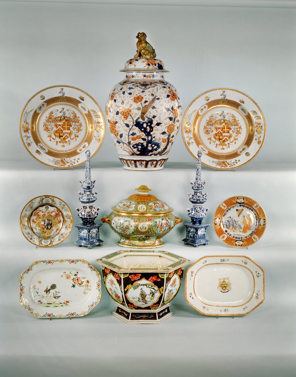 Imari baluster vase; Rose-verte armorial dish, c.1724; Famille rose bombe tureen and cover; Two blue and white tulip vases; Famille Rose armorial plate; Imari plate by Cornelius Prenk; Famille Rose oblong dish; Famille Rose hexagonal jardiniere by Qing Dynasty Chinese School