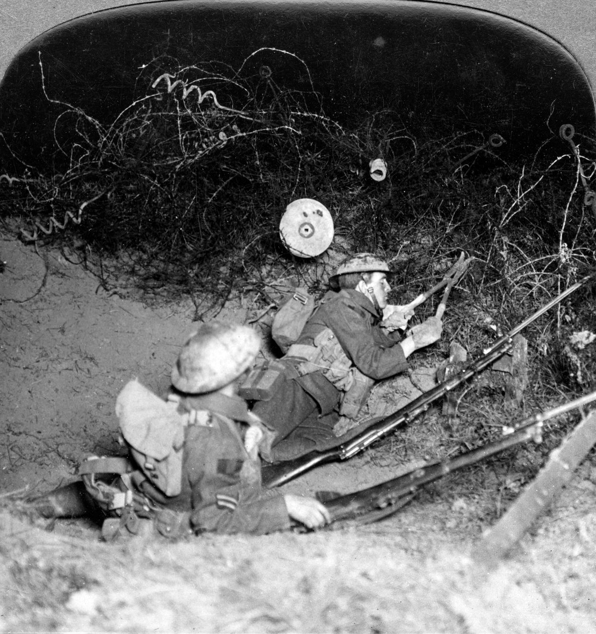 Soldiers cutting through barbed wire defences, Oppy, France, World War I, 1914-1918 by Realistic Travels Publishers