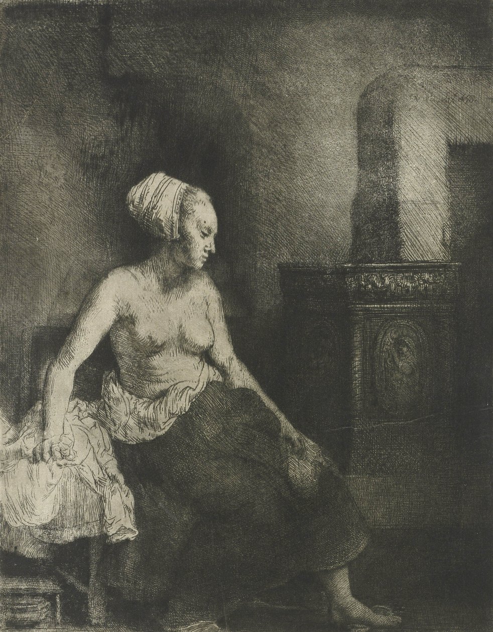 Half Naked Woman at a Stove by Rembrandt van Rijn