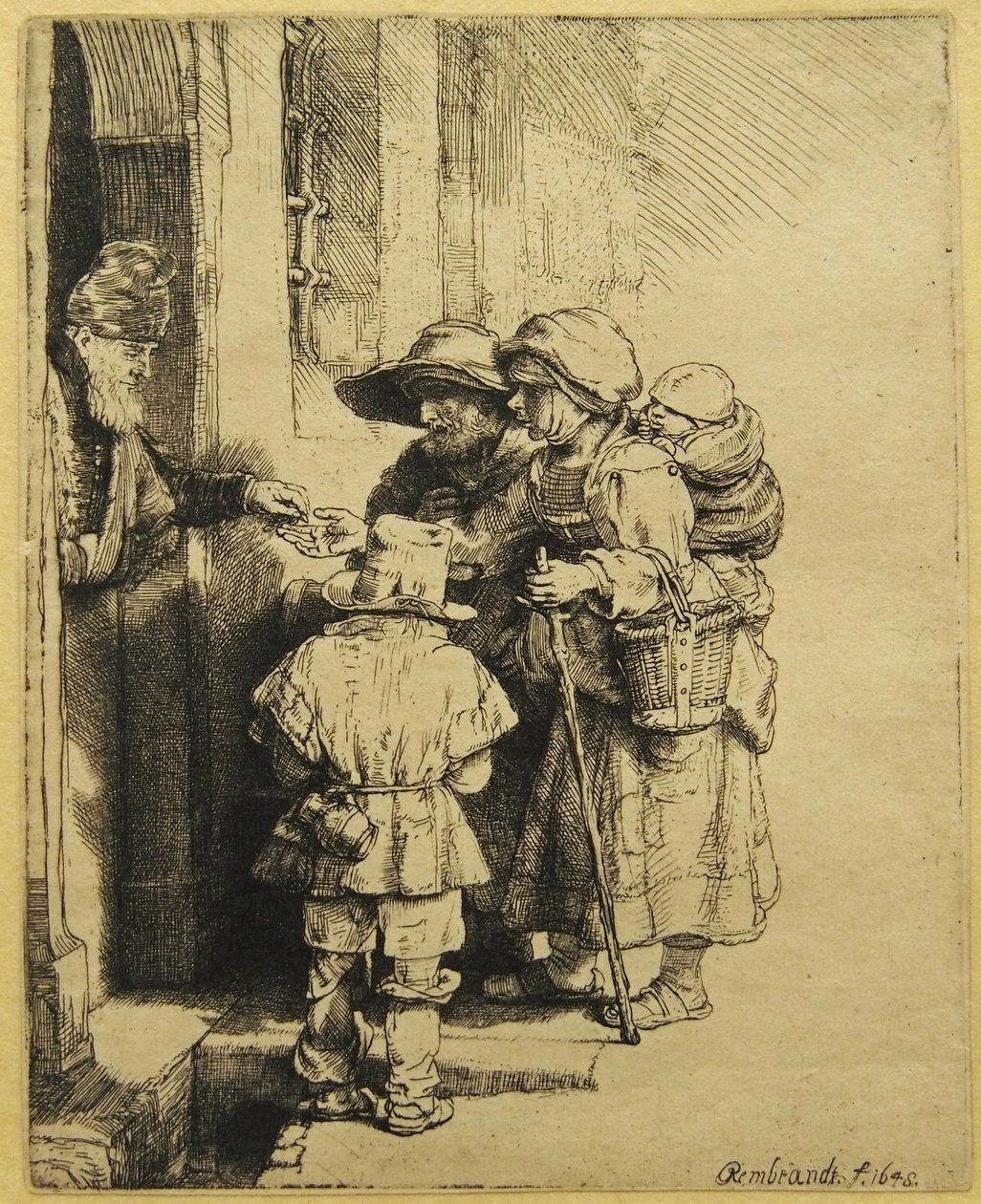A Blind Hurdy-gurdy Player and Family Receiving Alms by Rembrandt van Rijn