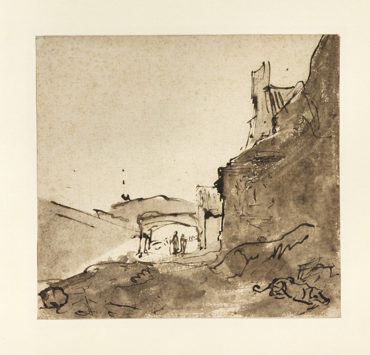 Outskirts of a town with walls and a doorway by Rembrandt van Rijn