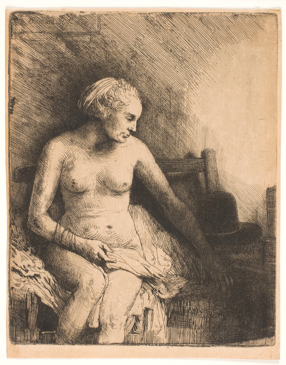 Woman at the Bath, with a Hat Beside Her by Rembrandt van Rijn