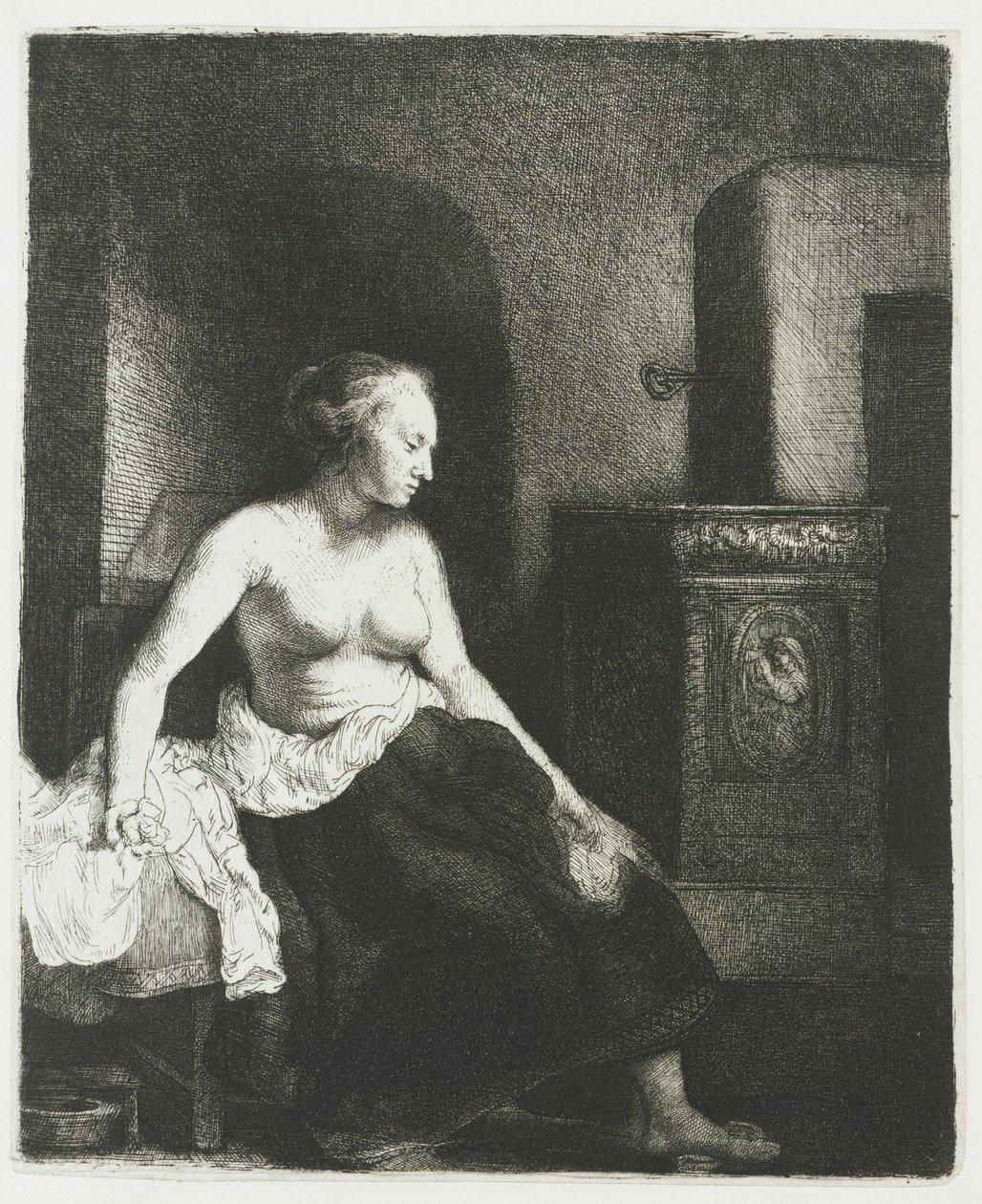 Woman Sitting Half Dressed Beside a Stove by Rembrandt van Rijn