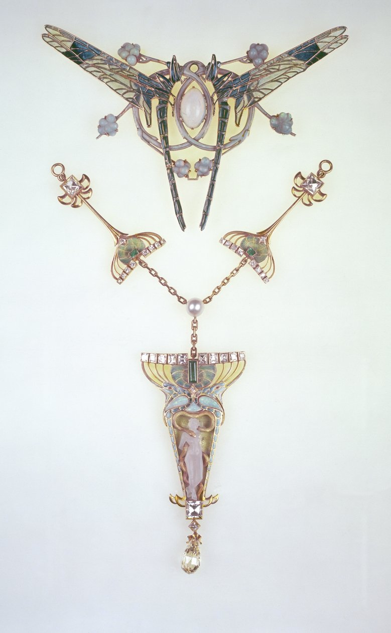 Hair ornament by Lalique and pendant by Philippe Wolfers by Rene Jules Lalique