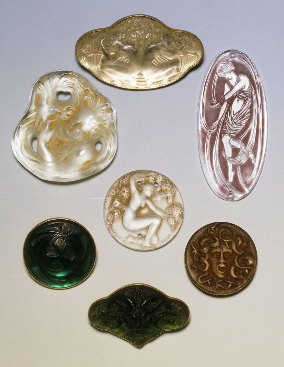Various glass brooches, seals and pendants by Rene Jules Lalique