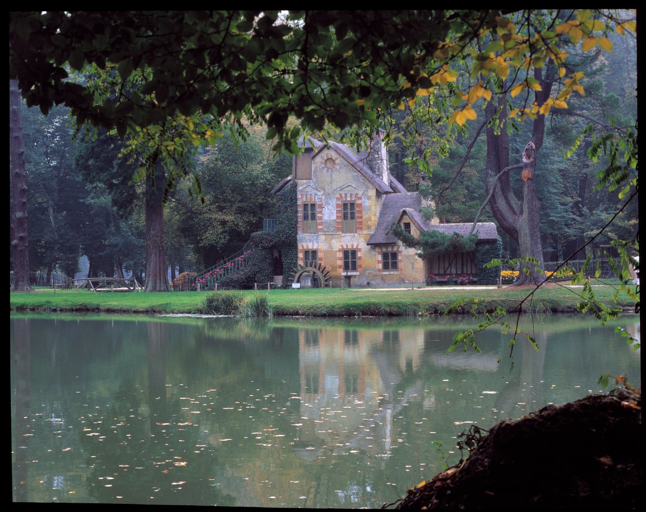 The Hameau de la Reine - La Maison de la Reine at the Hameau de la Reine Marie Antoinette, in the Park of the Chateau de Versailles by Richard Mique