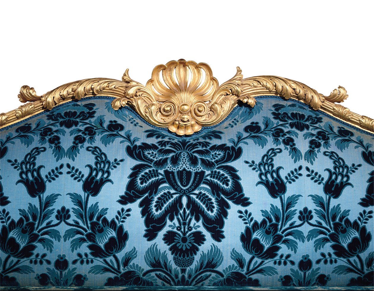 A George III giltwood sofa by Robert Adam