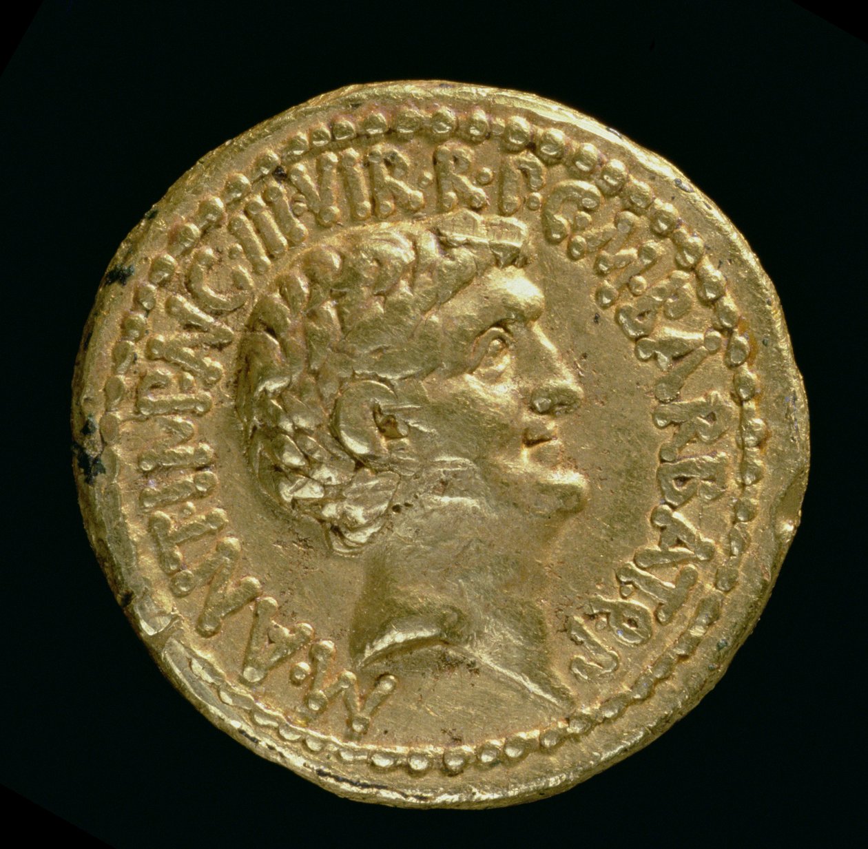 Aureus (obverse) with the Bare Head of Marcus Antonius (8281 BC-30 BC) Inscription: M ANT IMP AVG III VIR R P C M BARBAT Q P by Roman