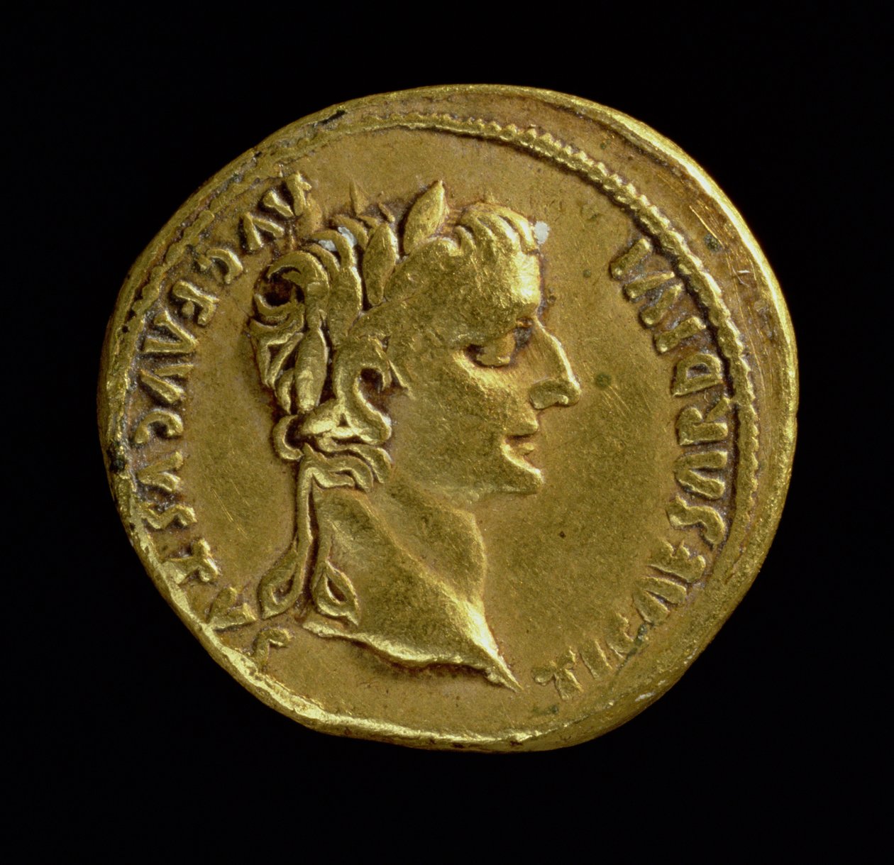 Aureus (Obverse) with the Head of Tiberius Wearing a Laurel Wreath. Inscription: TI CAESAR DIVI AVG F AVGVSTVS by Roman