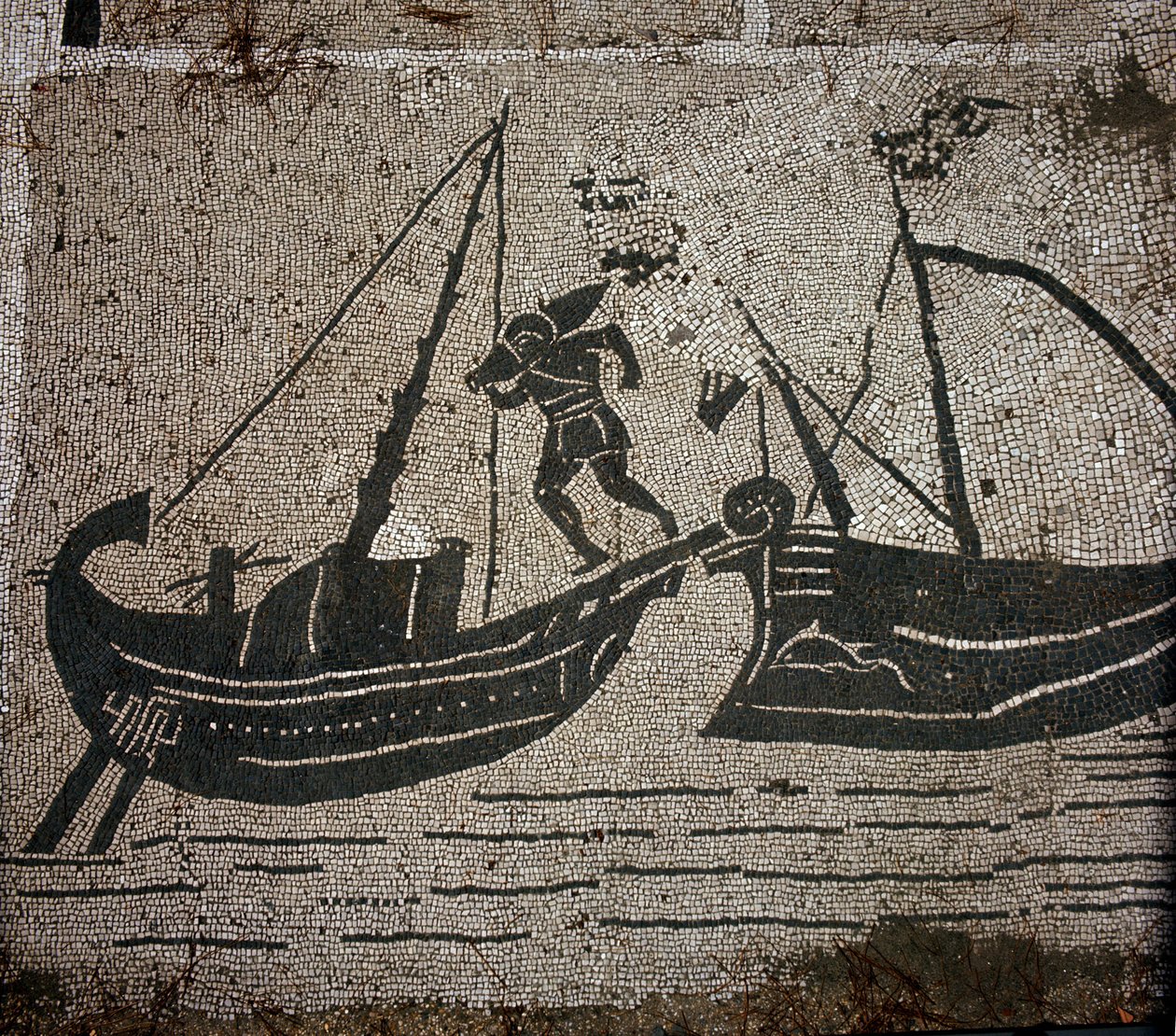 Ancient Ostia. Place des Corporations. Mosaic of the Sabratha Seafarers Corporation. Loading goods on a vessel by Roman