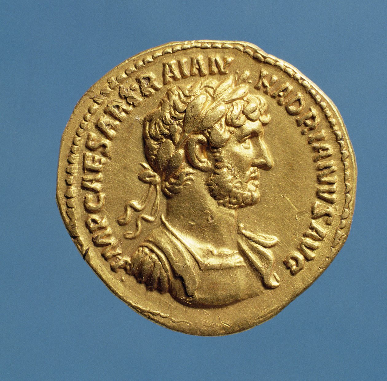 Aureus (obverse) of Hadrian draped, cuirassed, wearing a laurel wreath. Inscription: IMP CAESAR TRAIAN HADIANVS AVG by Roman