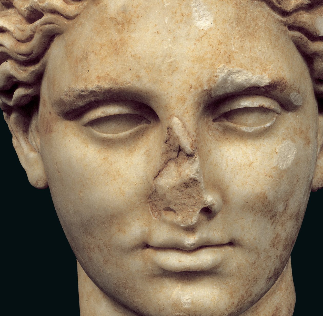 Head of Apollo Sauroktonos (the lizard killer) copy of a 4th century Greek bronze by Praxiteles, found in Kifissia (detail) by Roman