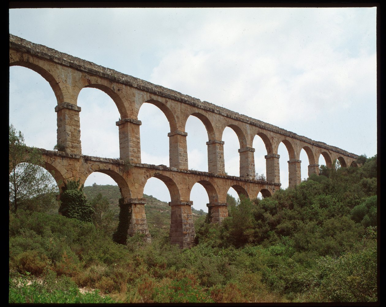 Roman Art: view of the Aqueduct of Tarragona (Aqueduct of the Ferreres or Pont du Diable) 1st century, Spain by Roman