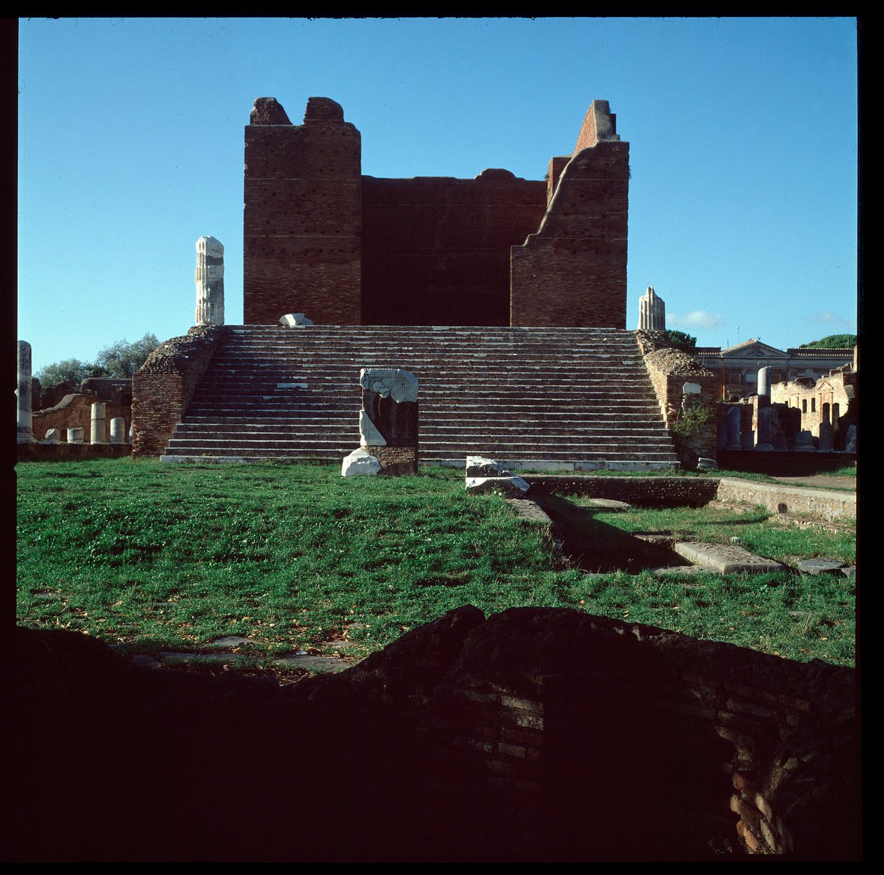 Roman art: view of the ruins of the capitol, archeological site of Ostia by Roman
