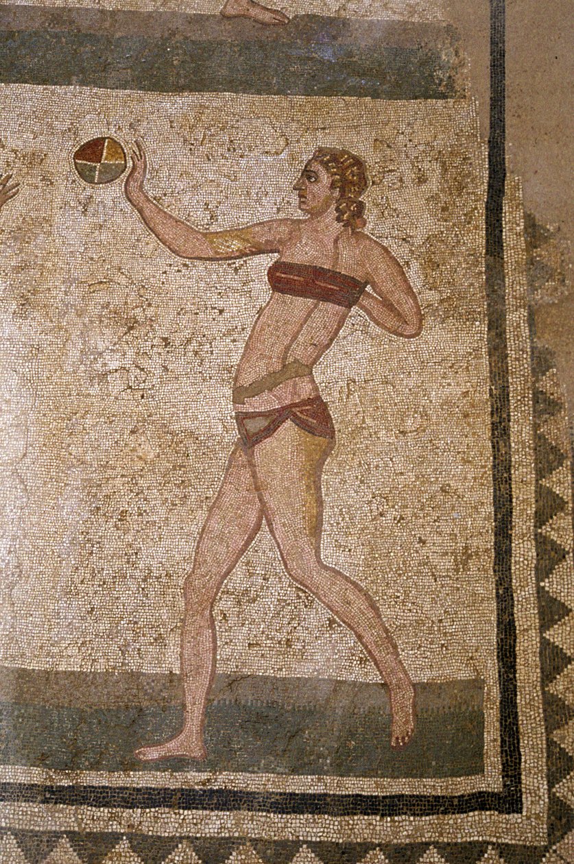 Woman playing ball. Young Romans engaged in physical exercises. They wear a  loincloth around the kidneys