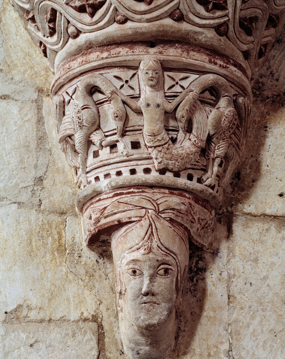 A mermaid, carved capital of the chancel by Romanesque