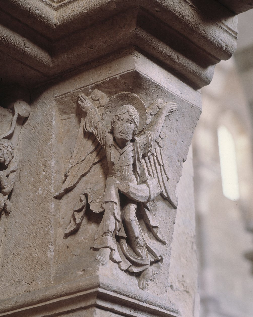 South portal: an angel brings the good tidings (angel with an olifant) by Romanesque