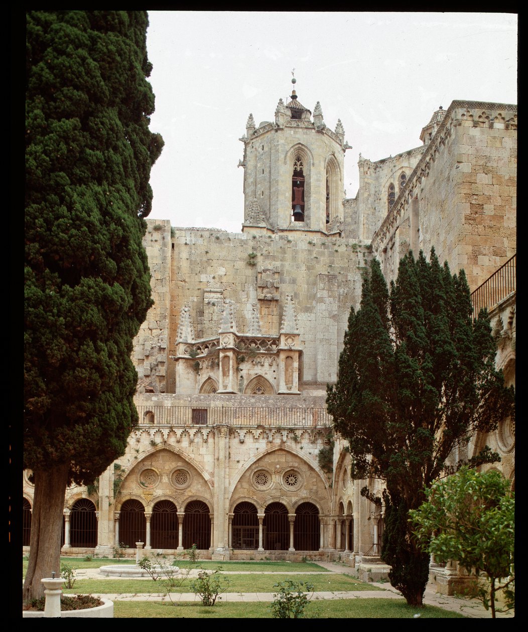 View of the cloister and the cathedral of Saint Thecla in Tarragona by Romanesque