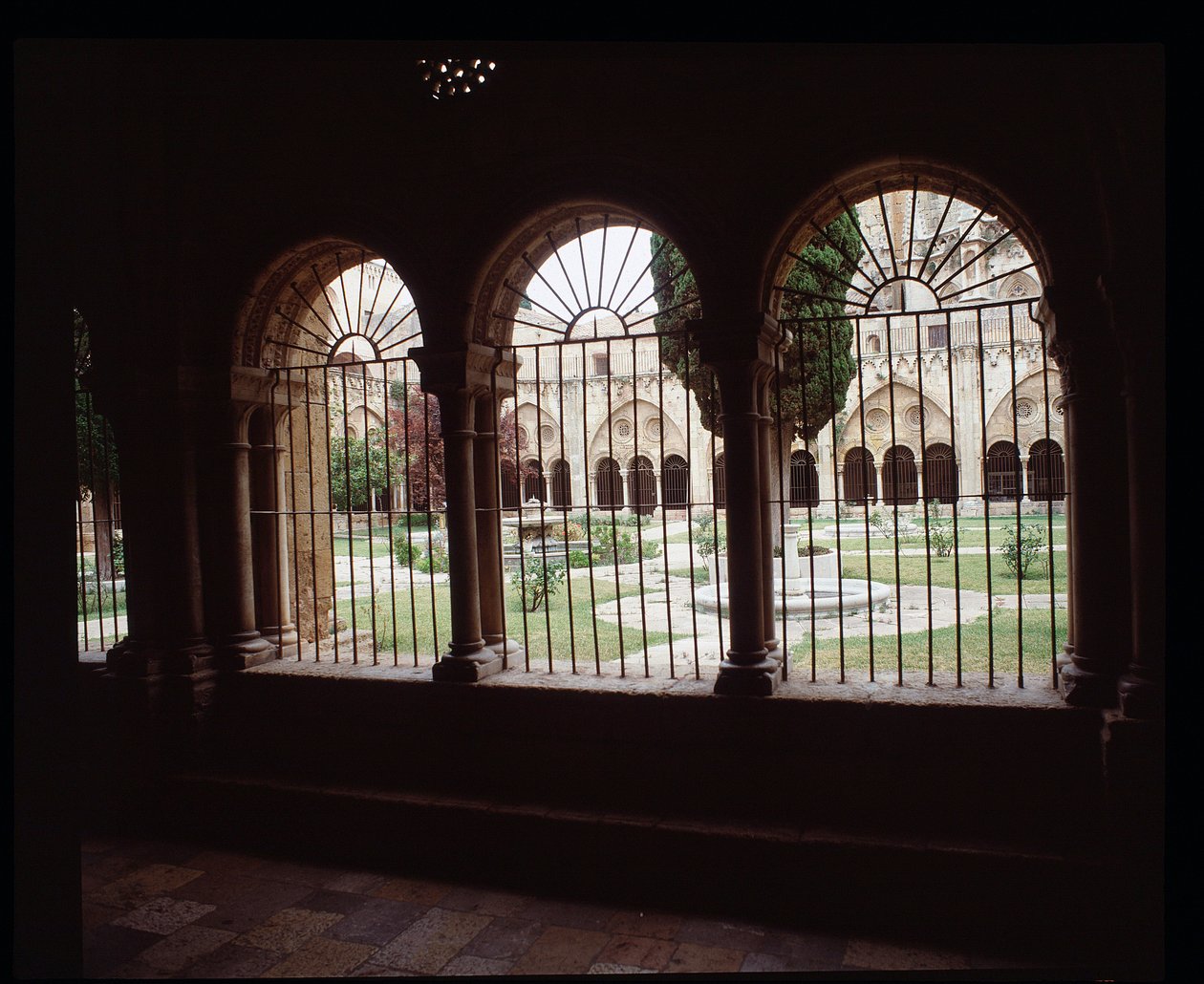 View of the cloister of the Cathedrale Sainte Thecle in Tarragona by Romanesque