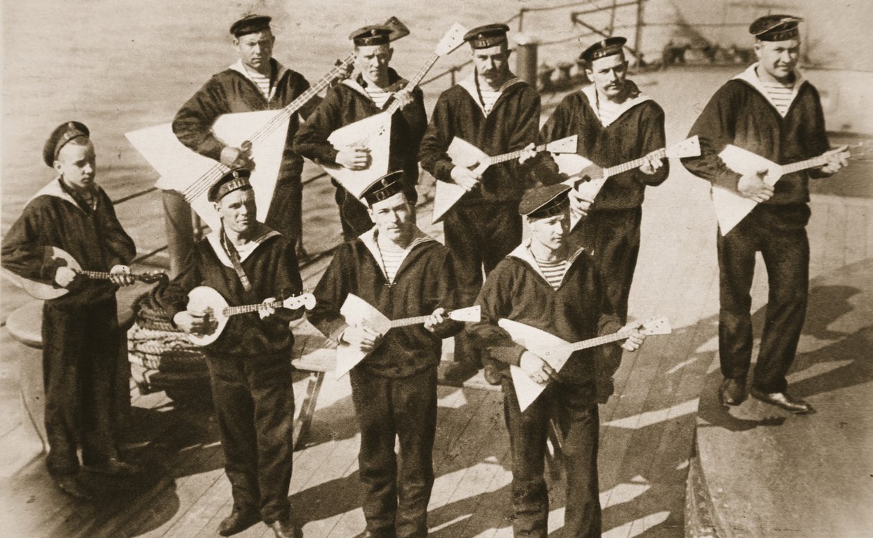 The Balalaika band, keeping up the spirits of the Russian Navy (from The Illustrated War News) by Russian Photographer