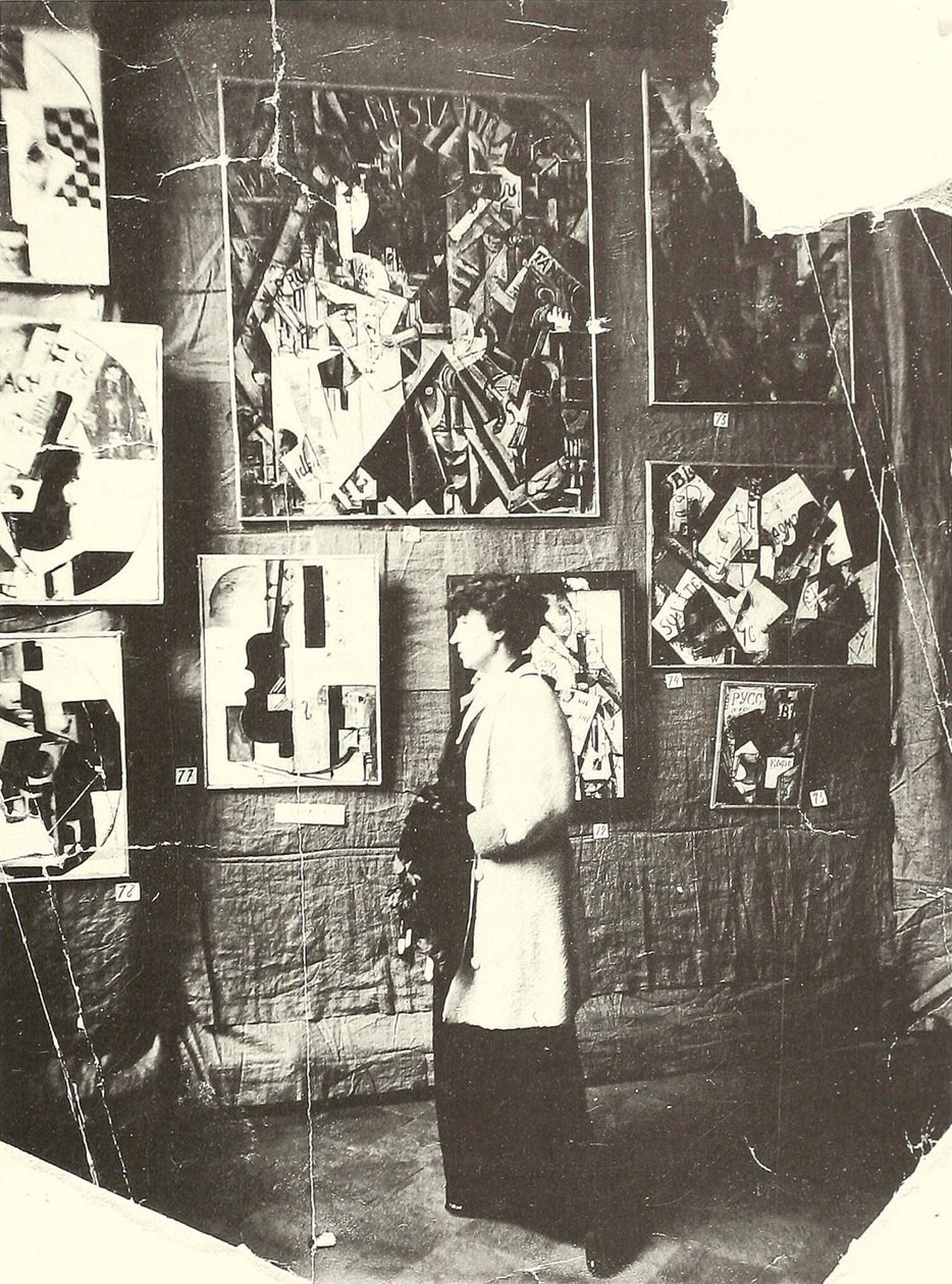 Alexandra Ekster in Front of Udaltsova’s Paintings at the Exhibition The Store, Moscow by Russian Photographer