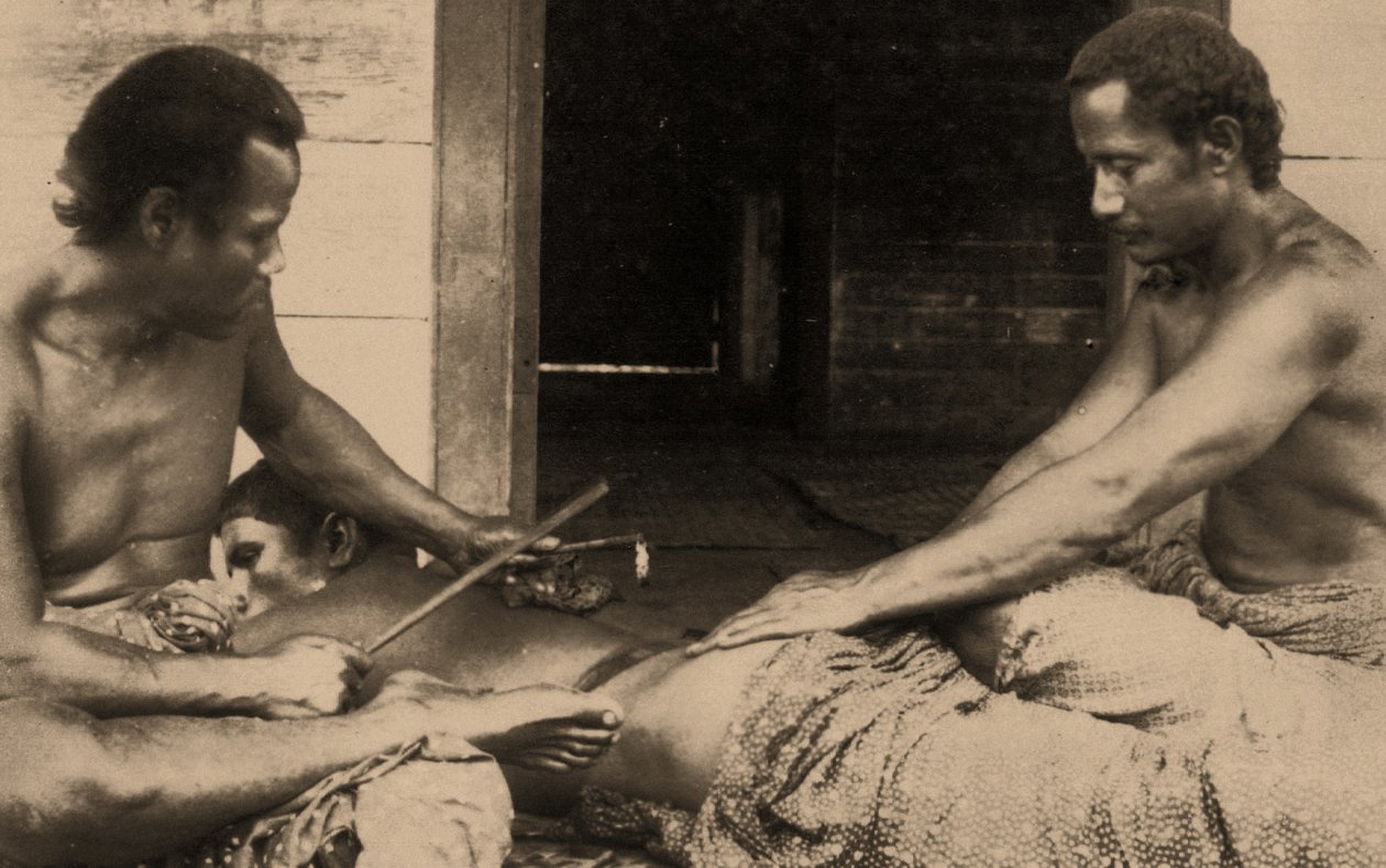 A Samoan Man Being Tattooed, c.1895 by Samoan
