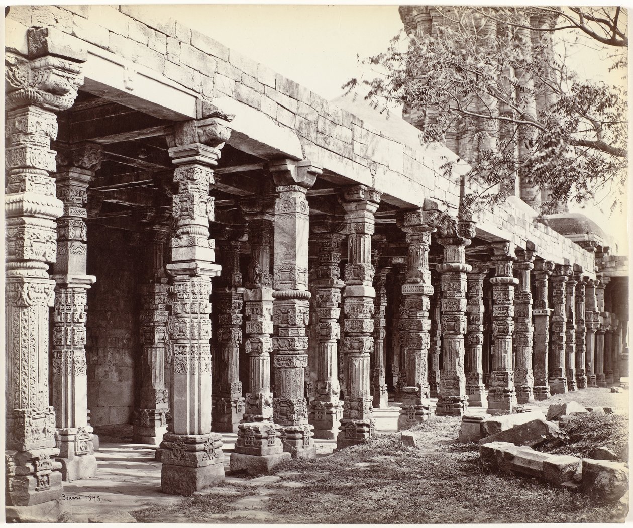 Colonnade with Ornaments at the Base of the Qutb Minar in Delhi by Samuel Bourne (signed by artist)