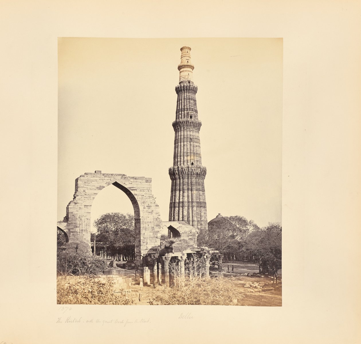 Delhi; The Kutub Minar, with the Great Arch, from the West by Samuel Bourne