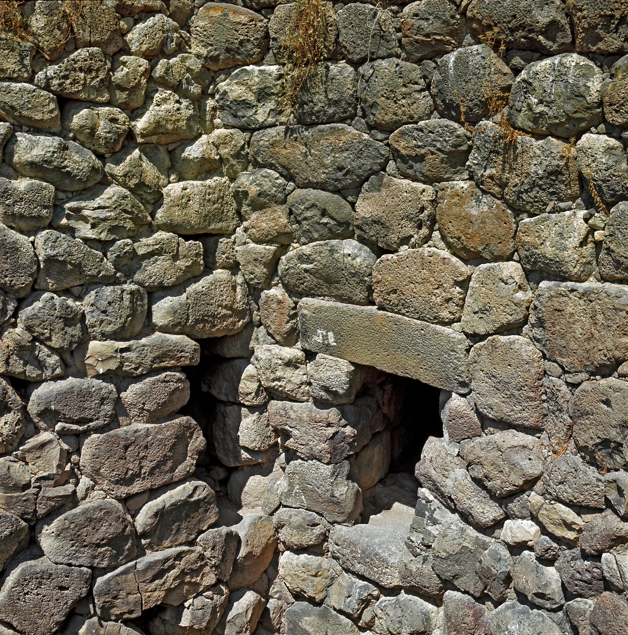 Ruins of the nuragic city of the megalithic site of Su Nuraxi: the royal tower. 1100-1050 BC. Barumini, Sardinia, Italy by Sardinia Nuragic Civilization