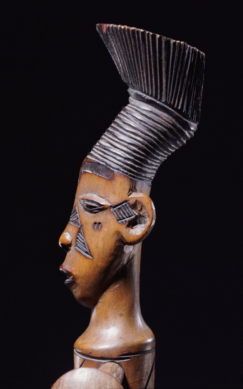 (detail) of a fine Magbetu harp depicting the head finial in profile by School African
