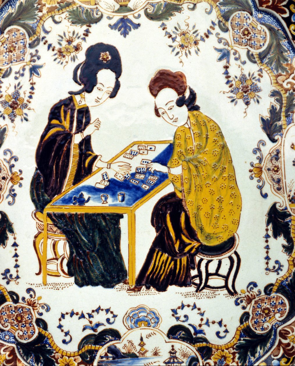 Two women playing checkers. China 18th century. ceramic. Milan by School Chinese