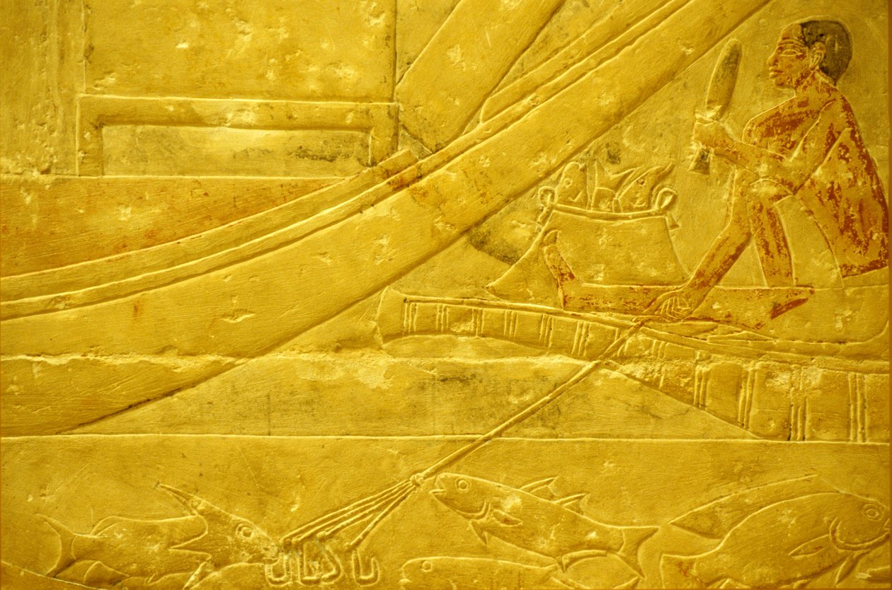 Ancient Egypt, Wall carving/painting, Mastaba/Tomb of Idout, Saqqara, 2323-2150 BC, A fisherman scaling fish and holding a four-pronged spear by School Egyptian