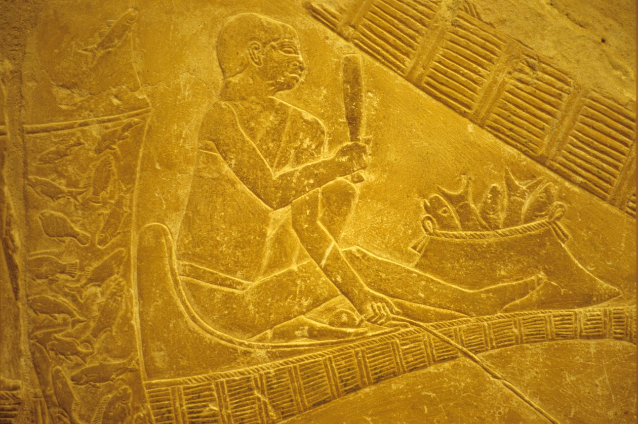 Ancient Egypt, Wall carving/painting, Mastaba/Tomb of Idout, Saqqara, Fishermen sit on boats scaling fish, 6th dynasty by School Egyptian