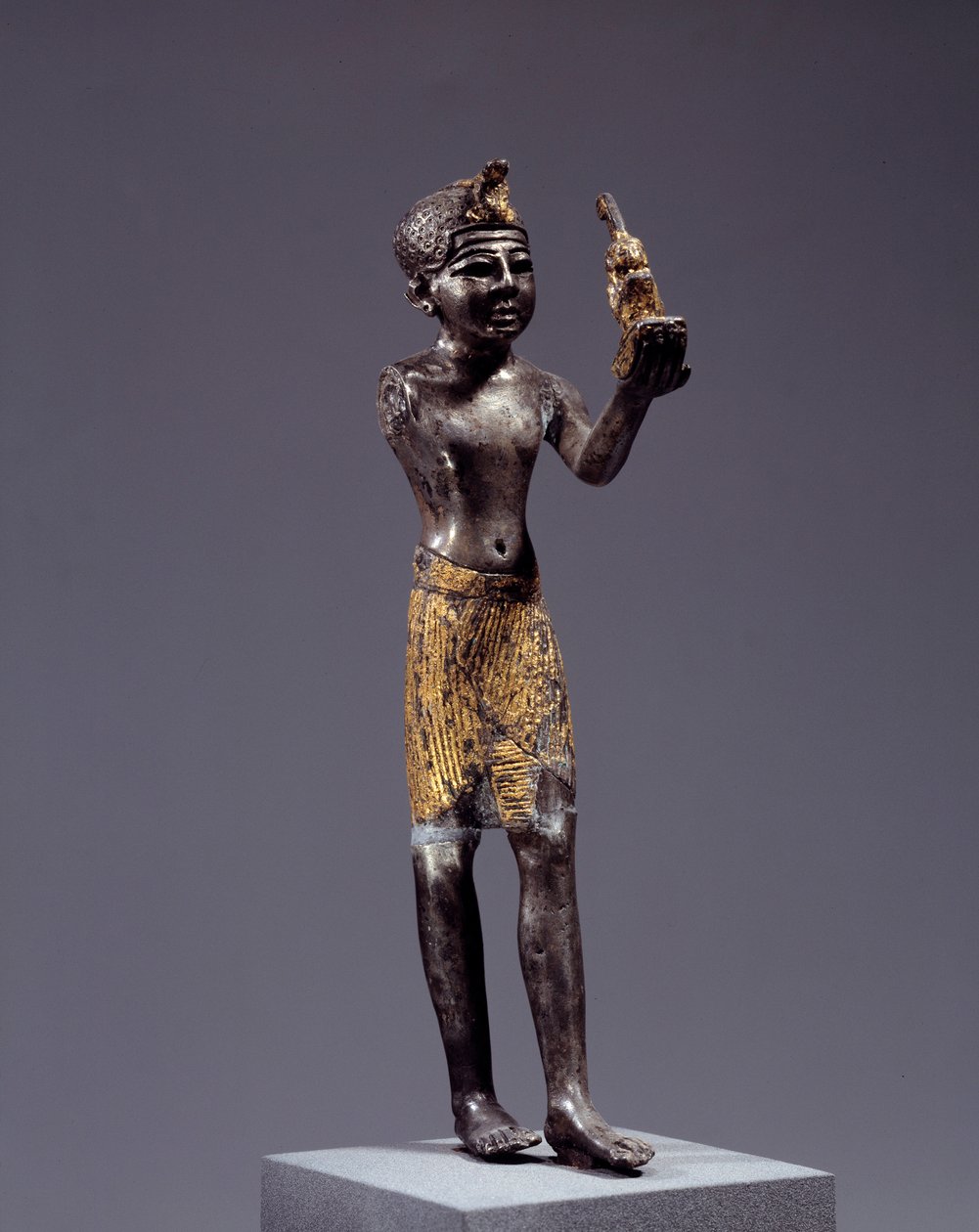Egyptian Antiquity: Statuette of King (Sethi I?) Making the Offering of Maat. Silver and Gold Sculpture. Reign of Sethi. Louvre Museum by School Egyptian