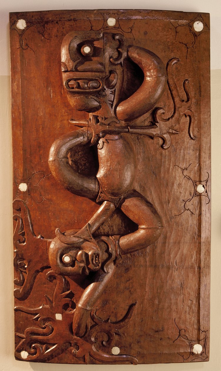 Carved door depicting the victory of the protective spirit over evil in Sarawak, Malaysia by School Malaysian