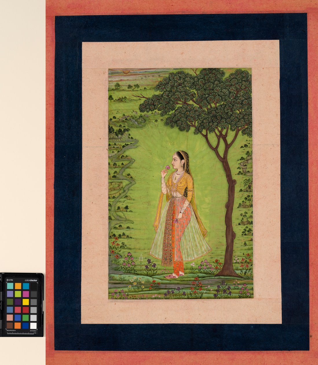 A woman standing by a tree, holding a flower by School Mughal