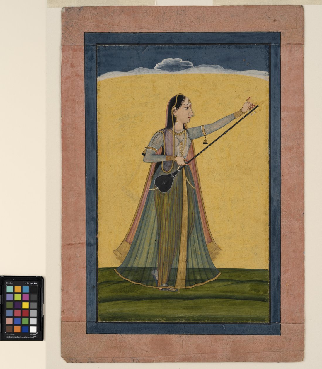 A Woman Tunes Her Tambura by School Pahari