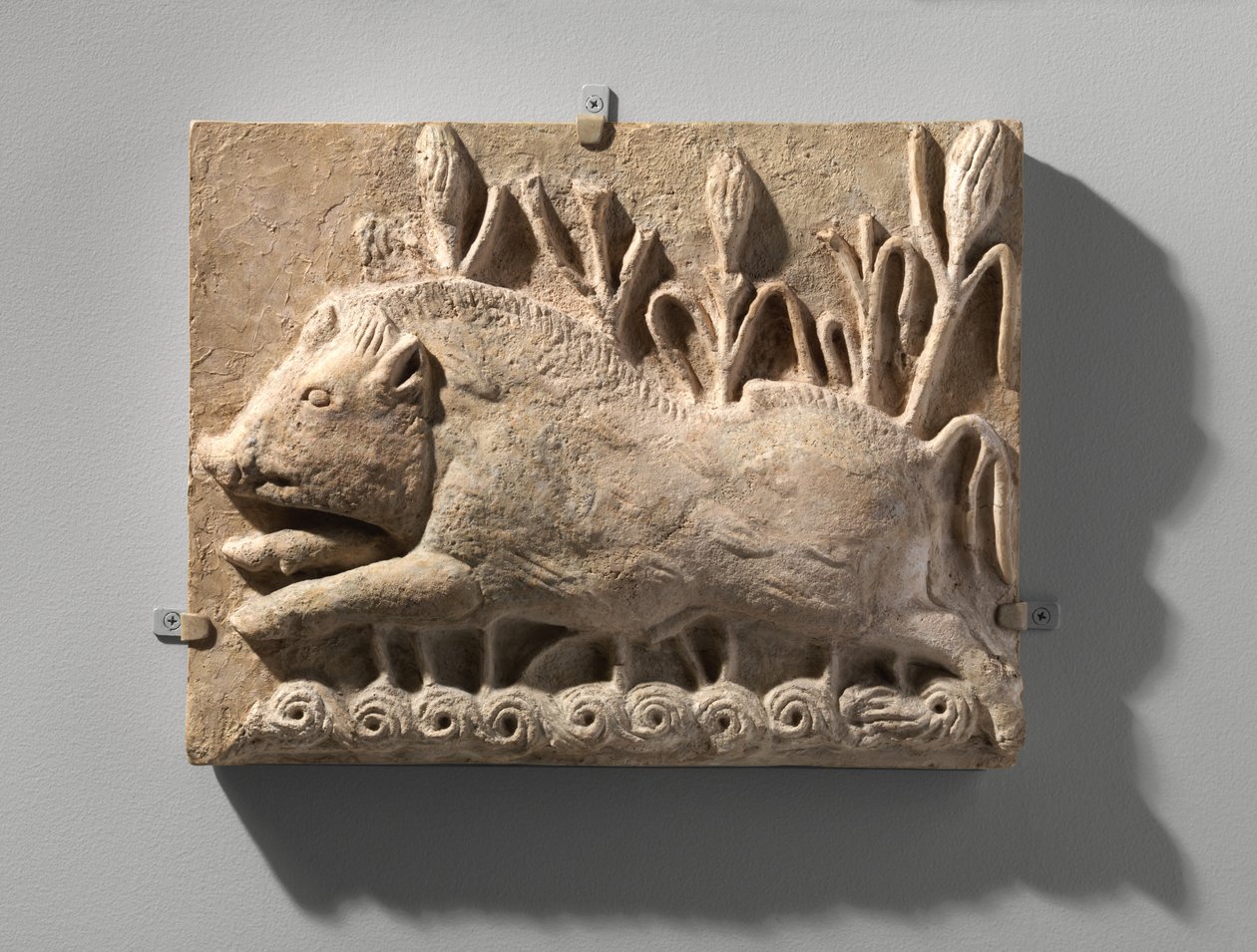 Wall panel with a charging boar, c.6th century AD by School Sasanian