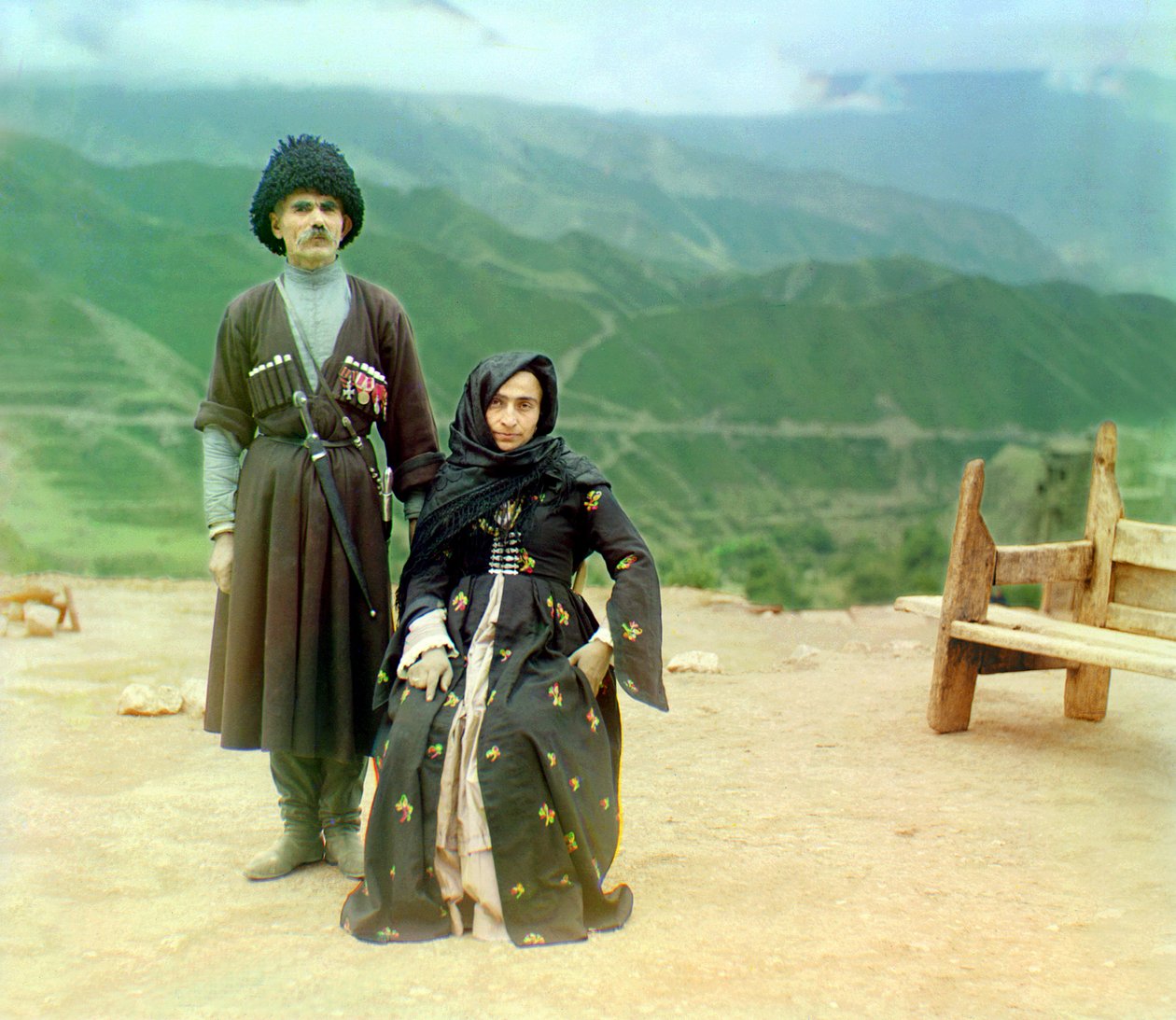 Dagestani Types – A Man with Medals and a Dagger and a Woman in Black Dress, Russian Empire by Sergey Prokudin Gorsky