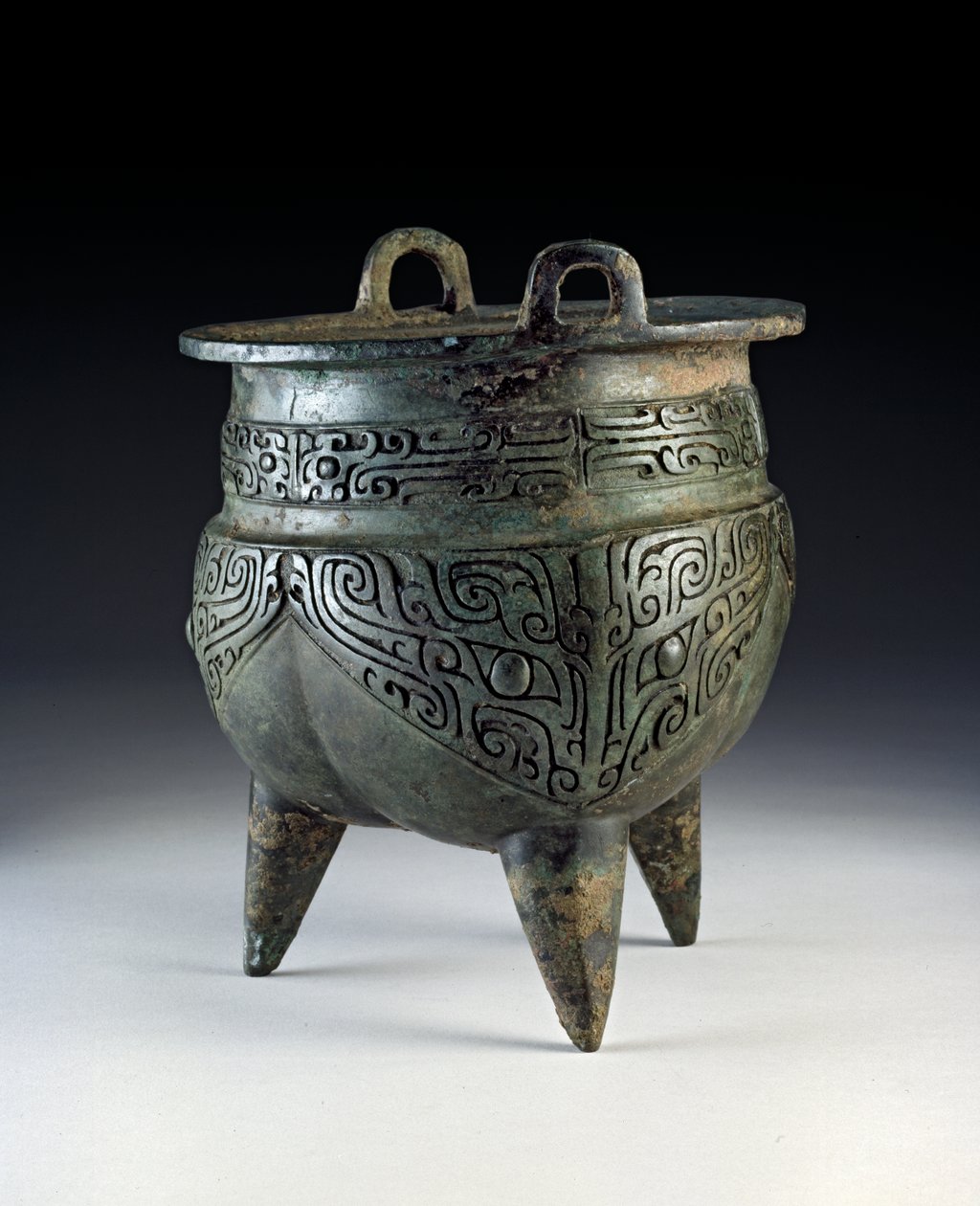 Li vessel, bearing the taotie design, Erligang period, Shang Dynasty, c.1500-1050 BC by Shang Dynasty Chinese School