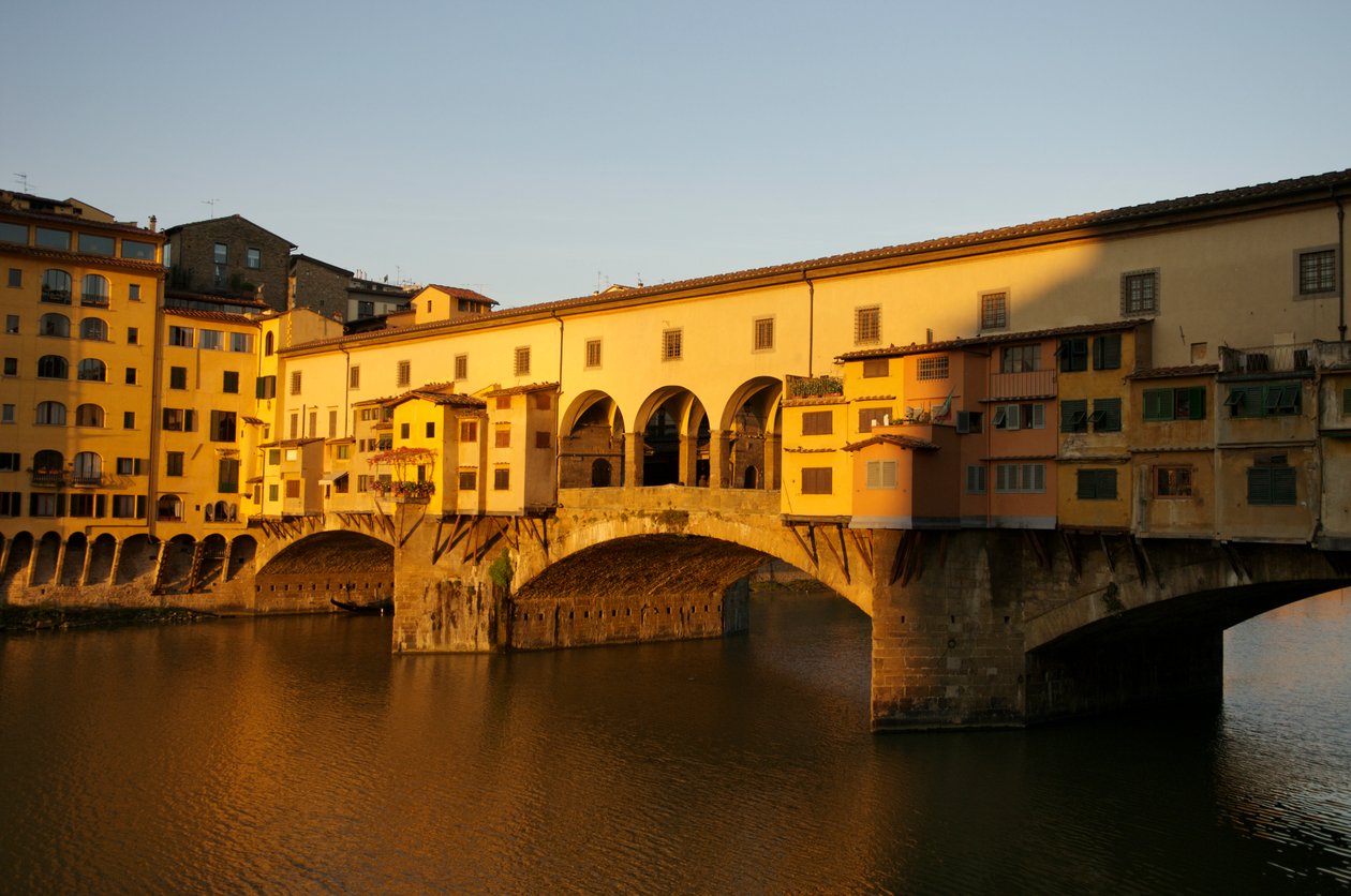 Early morning sunrise on Ponte Vecchio at dawn, Florence, Italy by Sisse Brimberg