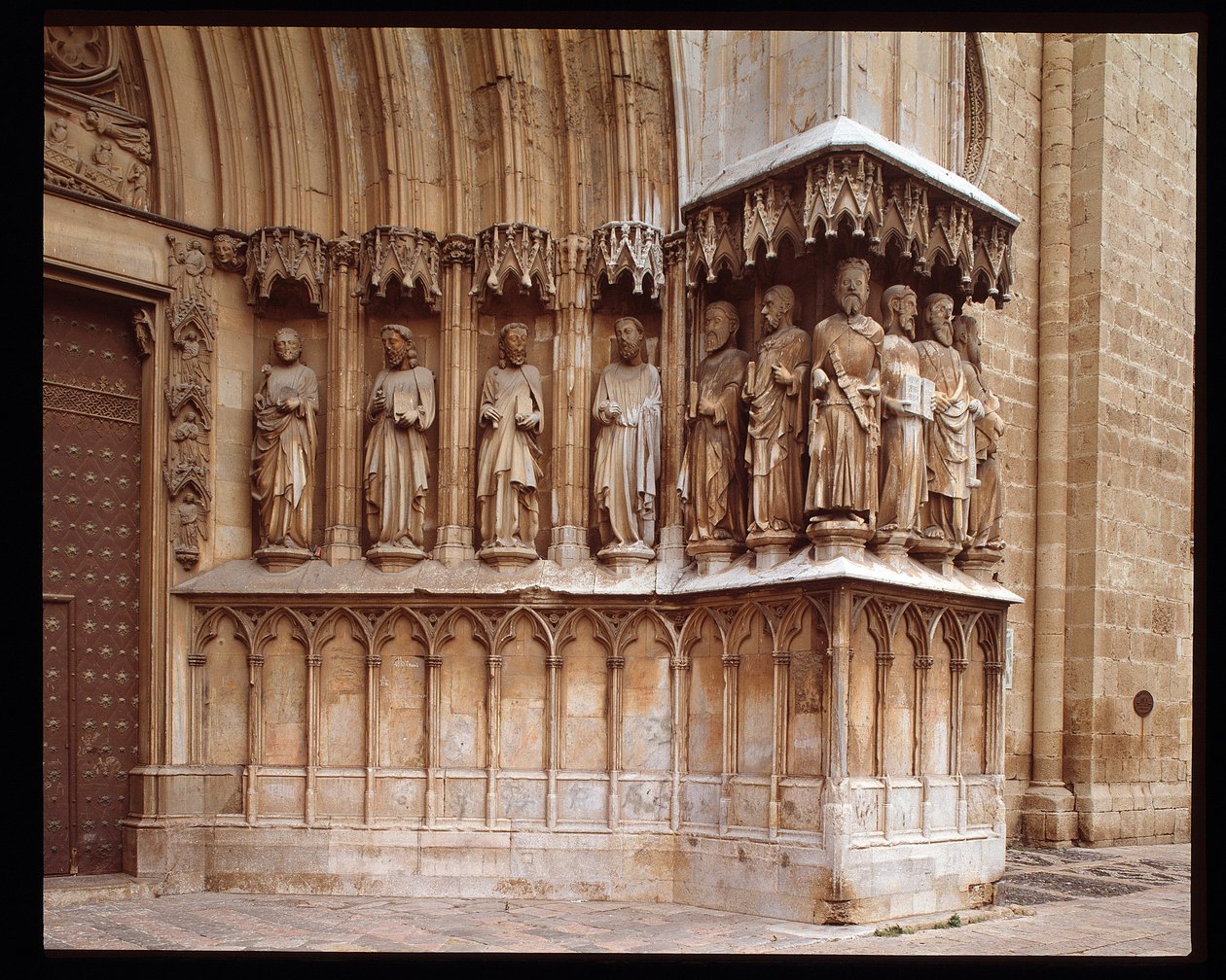 Gothic Art: detail of the central portal of the Cathedral of St. Thecle in Tarragona by Spanish School
