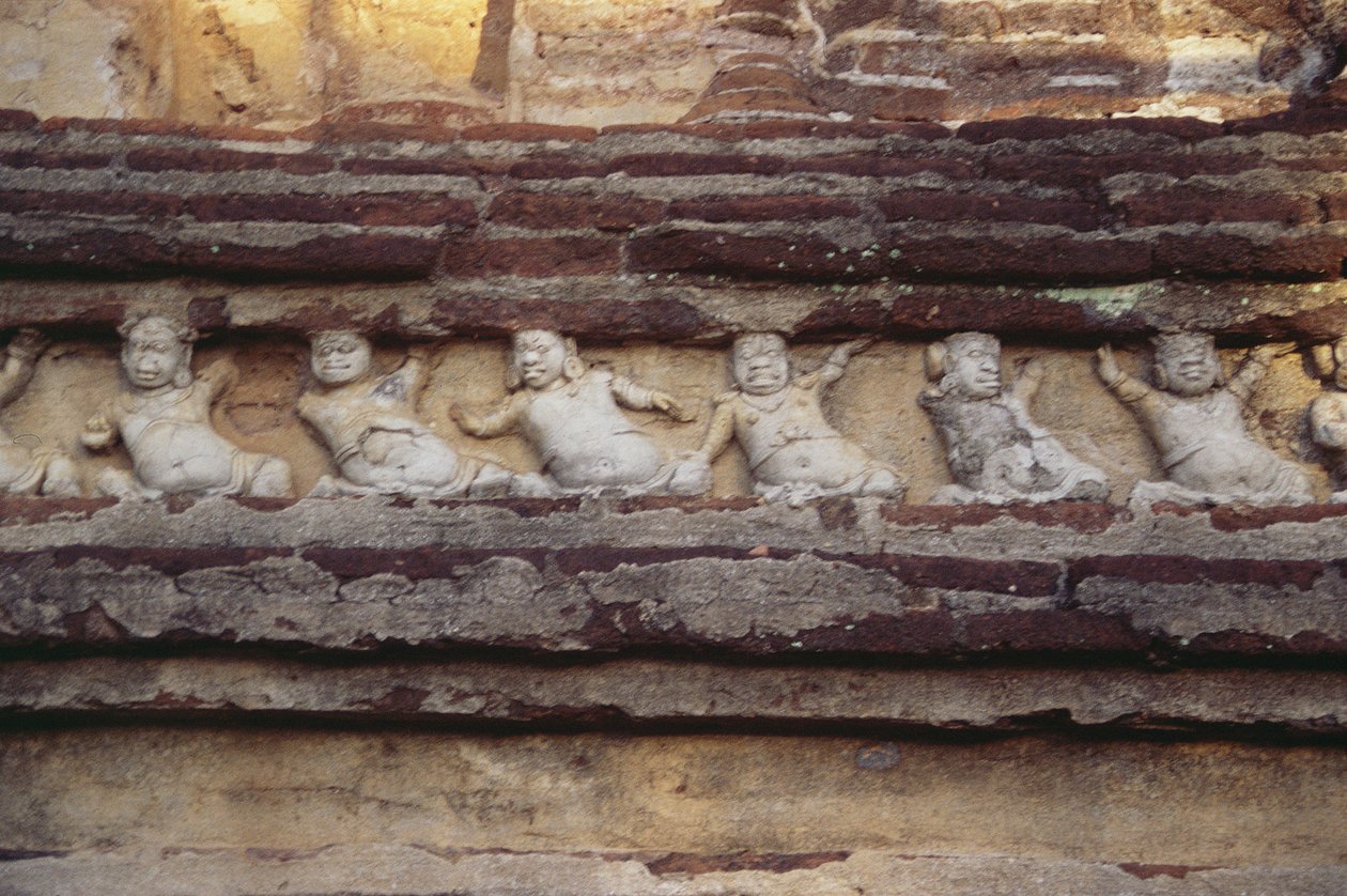 Relief depicting dwarves on the exterior of the Thivanka Image House by Sri Lankan
