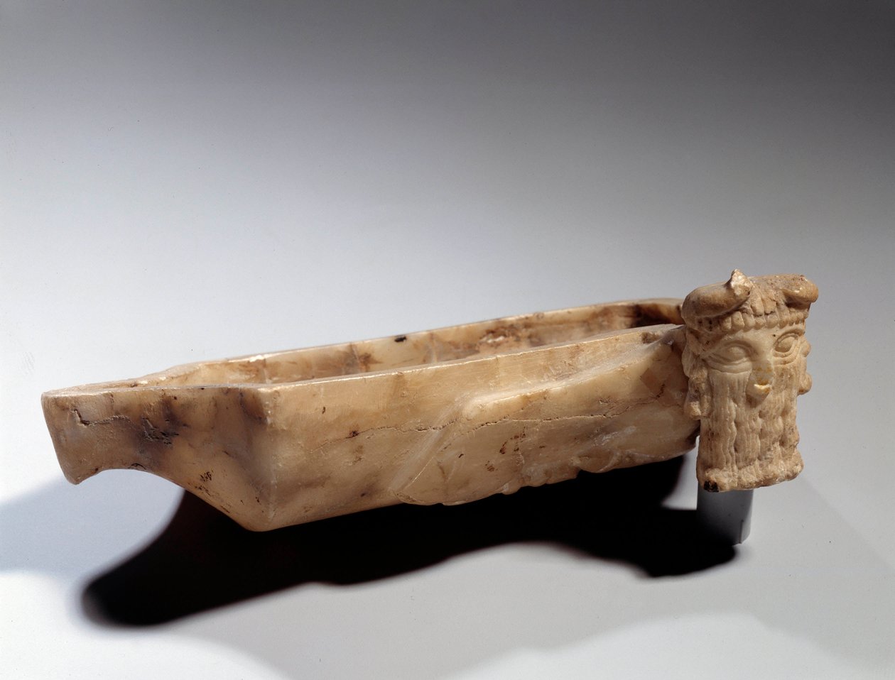 Art of Mesopotamia: Lamp decorated with an androcephal bull (in alabaster) Sumerian period (around 2400 BC). Paris, Musee Du Louvre by Sumerian Mesopotamian School