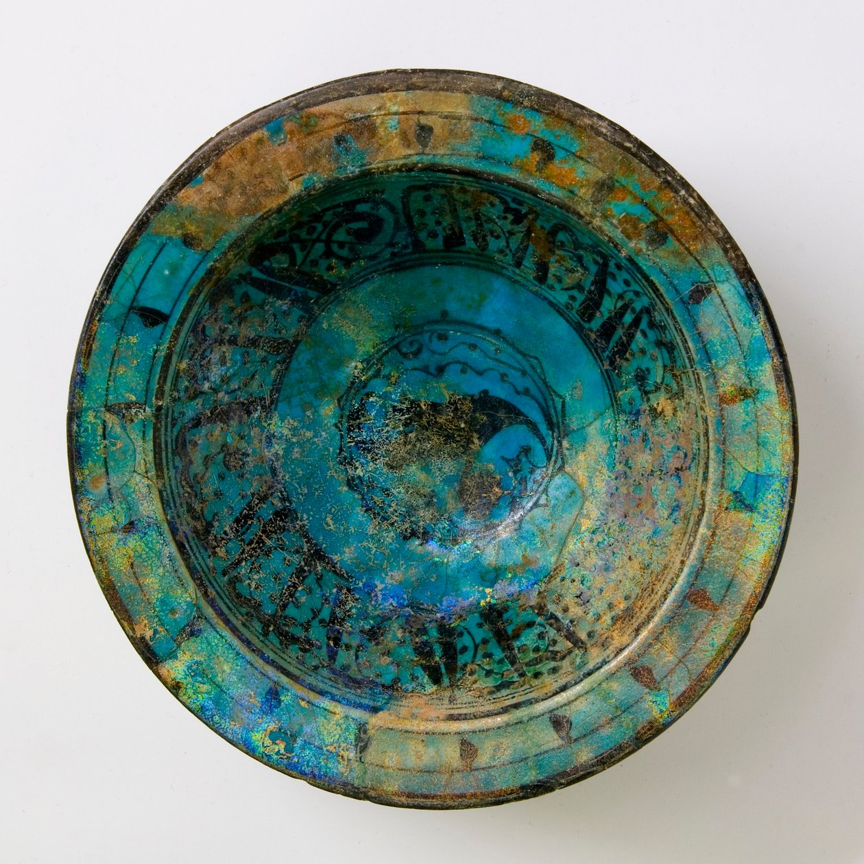 A 14th century turquoise Raqqa ceramic dish by Syrian School