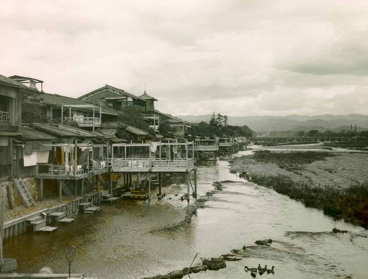 House on the Kamo-Gawa River near Kyoto, circa 1900 - 1915 by Teijiro Takagi